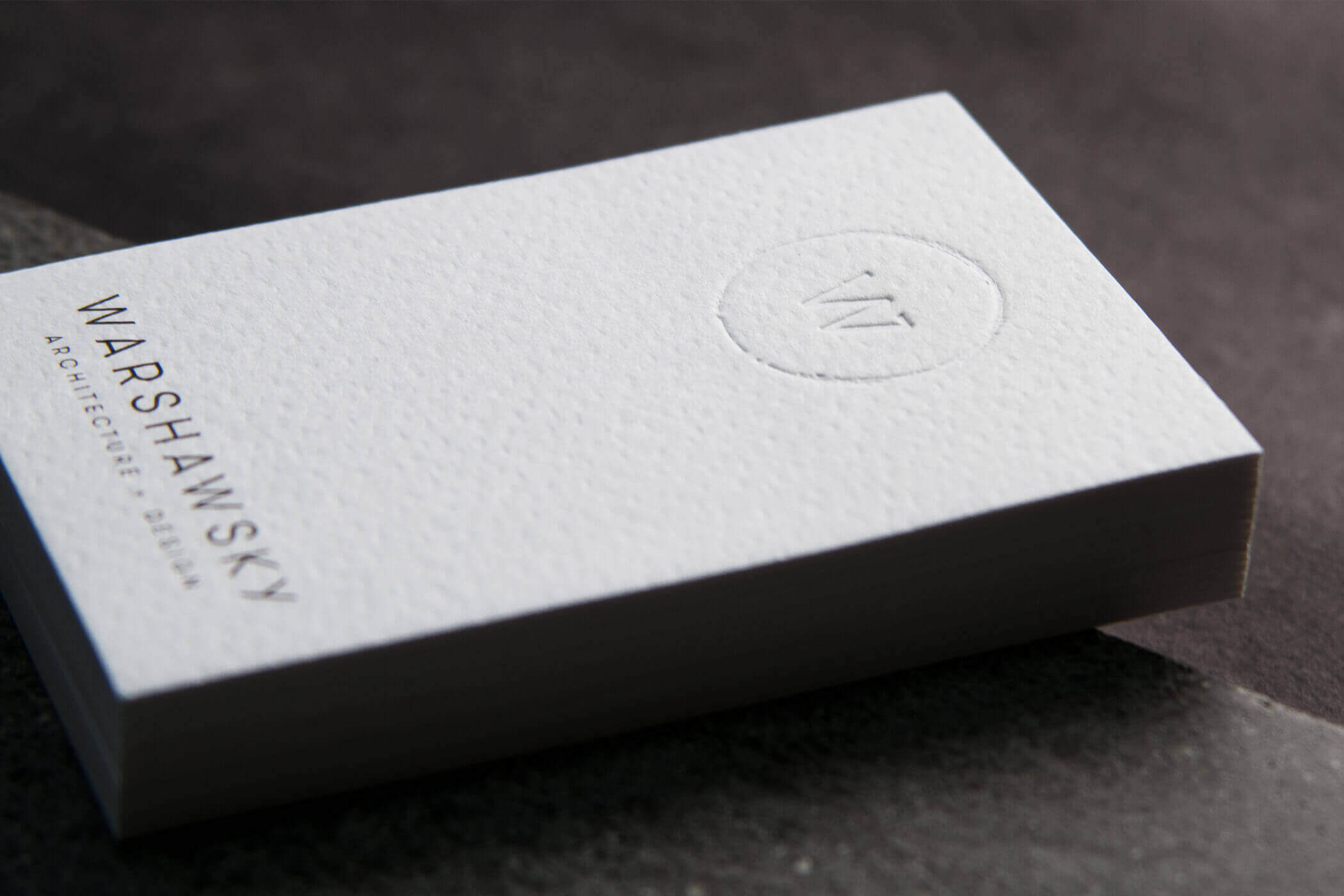 A close up of the Warshawsky business card.